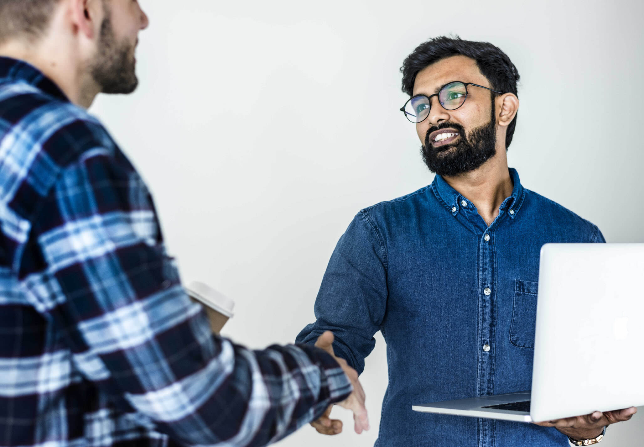 Translator and client shaking hands